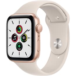 Apple Watch (Series SE) 2020 GPS 44 mm - Aluminium Or - Bracelet sport Lumière stellaire